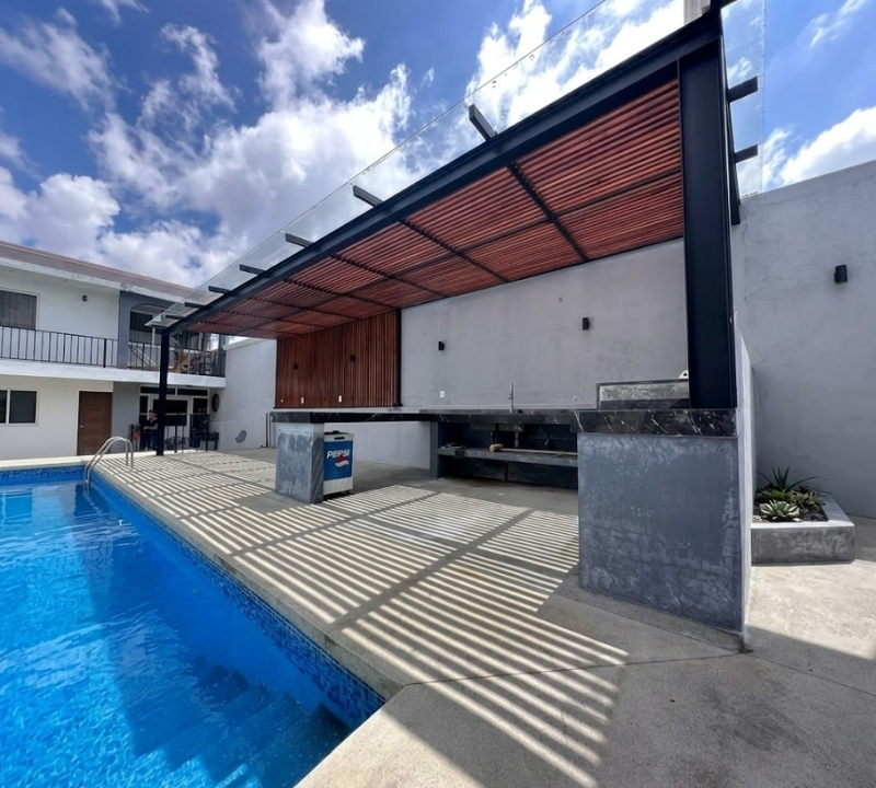 Pérgola con alberca Tecnoglass